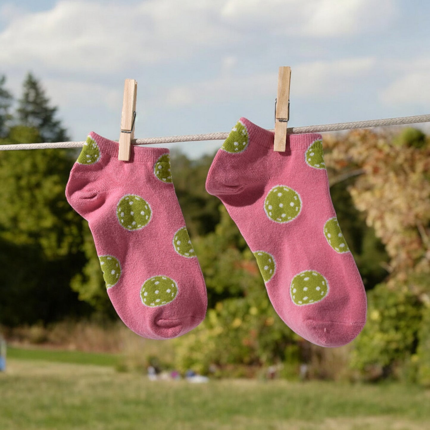 Women's pickleball socks in pink — side angle view